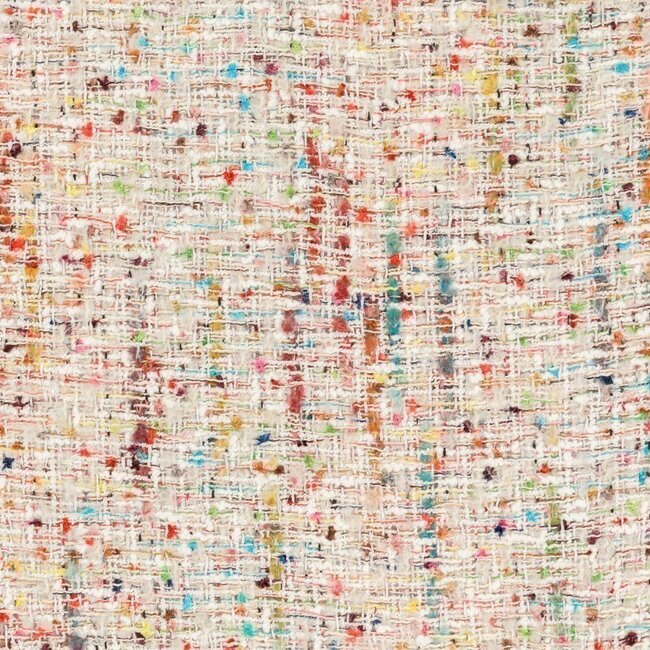 Thick white tweed with multicolored touches and metallic reflections. Luxurious texture.