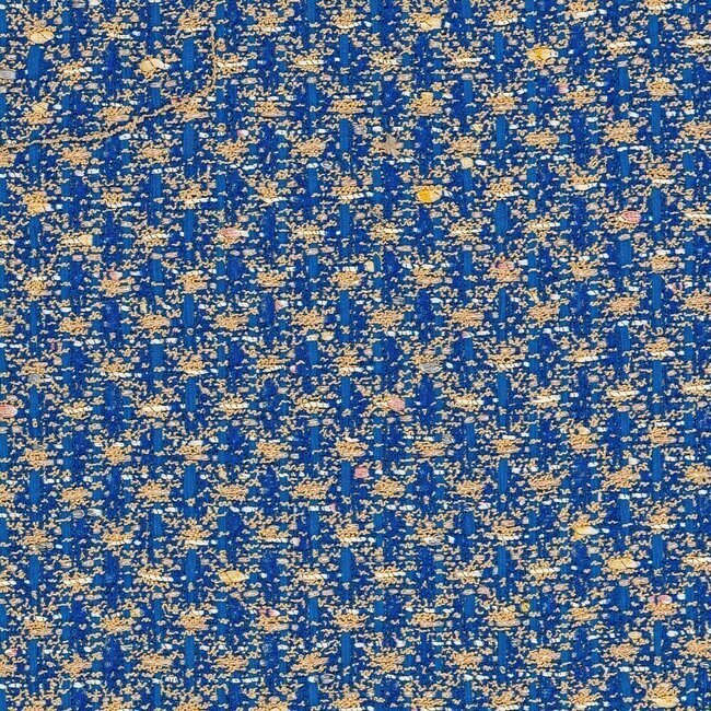 Medium blue and beige tweed with metallic fibres adding a subtle glow.