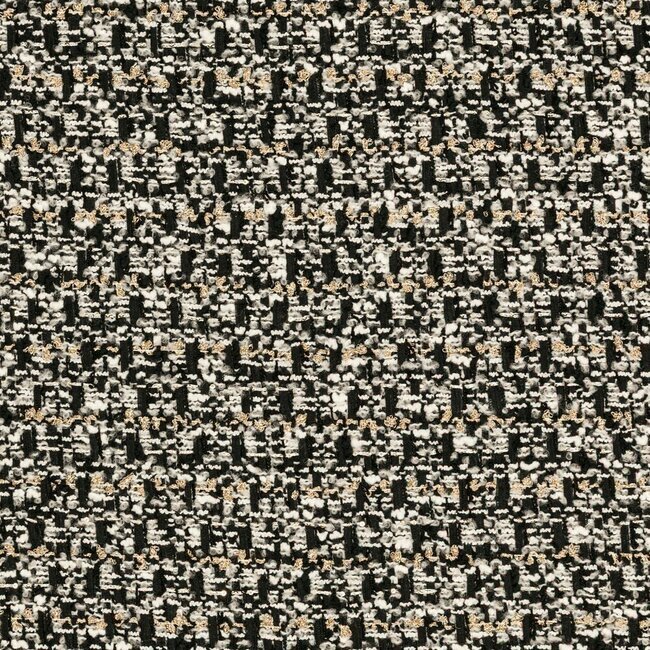 Contrasting black and white tweed with a graphic weave and discreet metallic reflections.