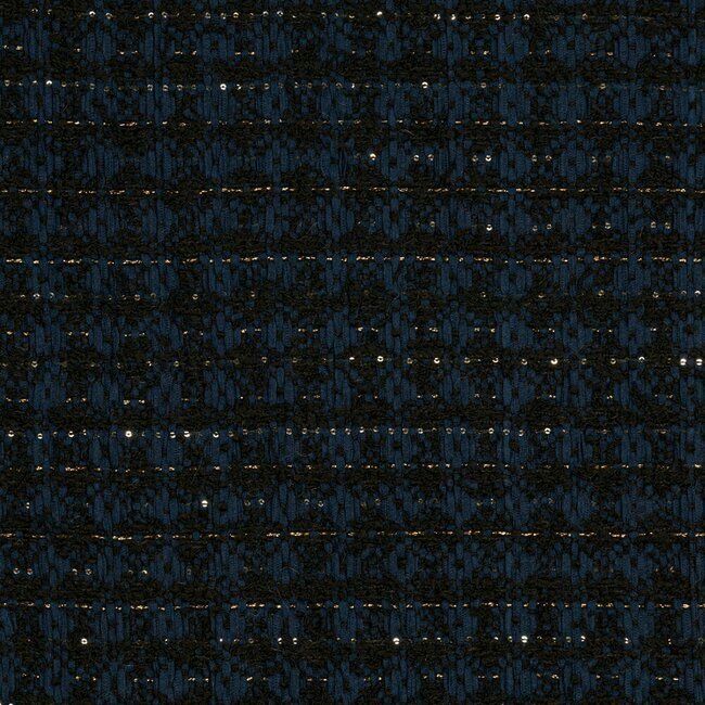 Deep blue tweed with a dense weave and alpaca touches for added softness.