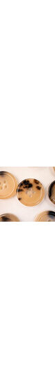 4 holes horn button 25% mottled 20mm (32L)