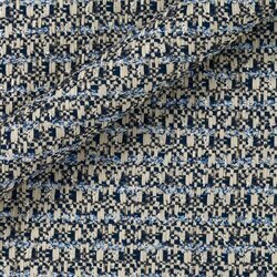 Mosaic tweed with white, cream and navy tones. Graphic texture.
