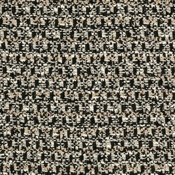 Contrasting black and white tweed with a graphic weave and discreet metallic reflections.