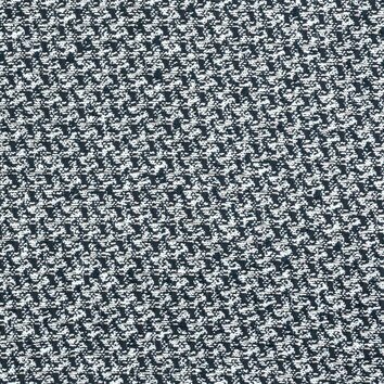 Black and white tweed with a houndstooth pattern. Tight and graphic weave.